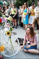Catherine McCarthy writes a note in rememberance of her friend Alice Swanson who was hit by a truck and killed in the area of Connecticut Ave and R St. NW.